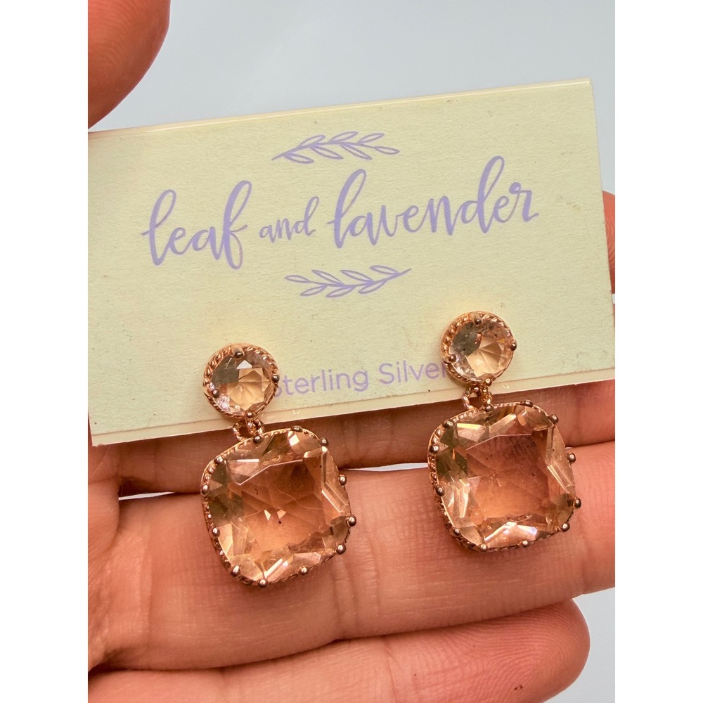 Leaf and Lavender brand earrings feature large, peach-colored silver. - Picture 3 of 5